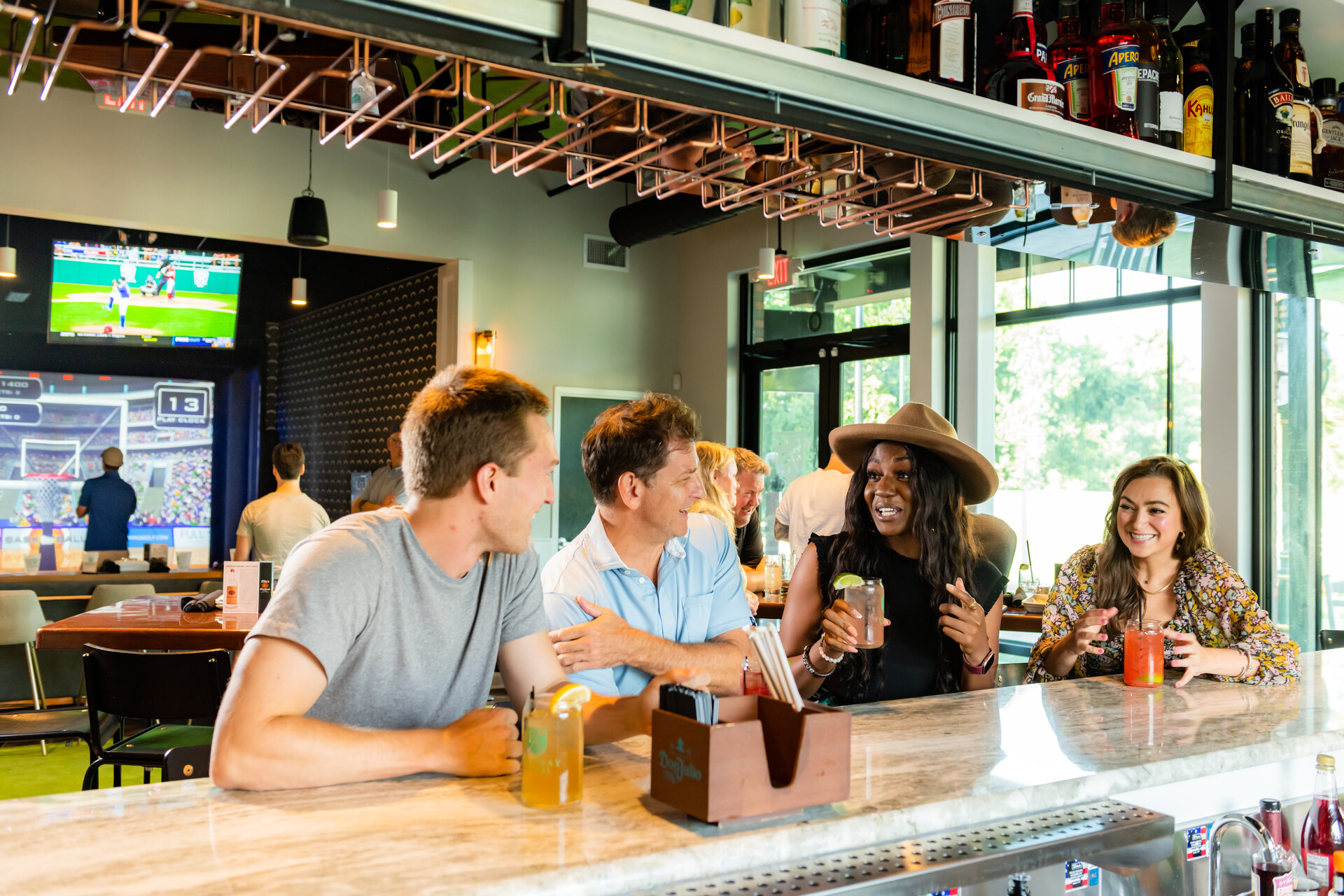 Group at bar at fairway social 