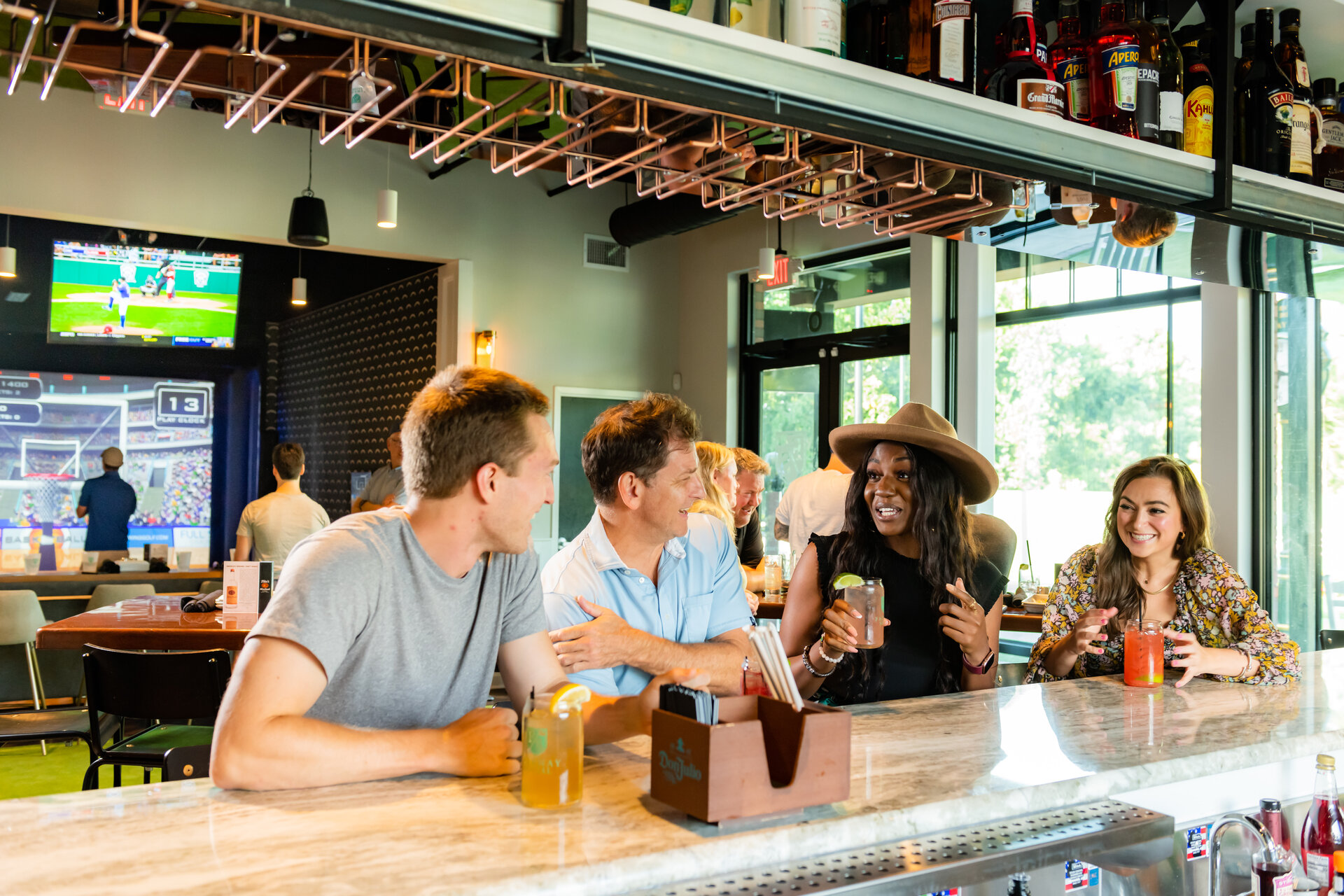 Group at bar at fairway social 