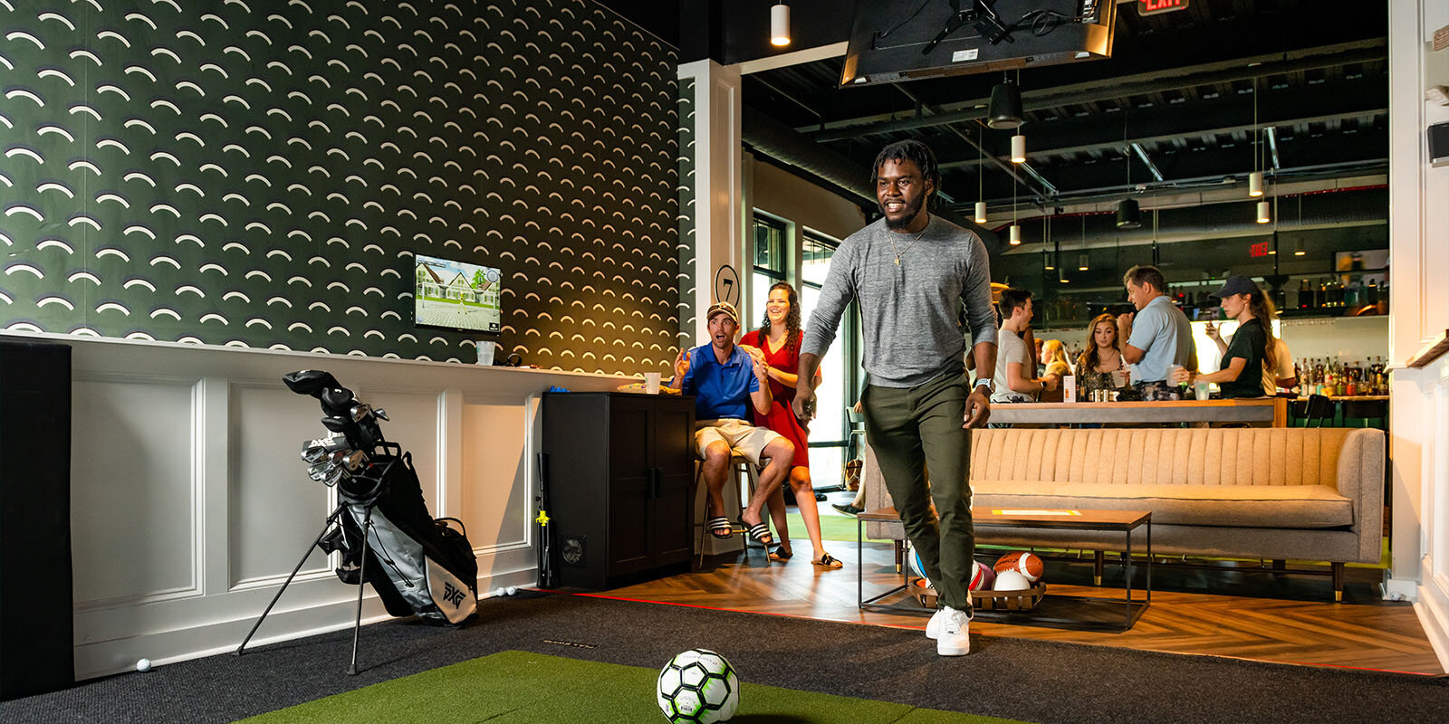 man playing soccer at fairway social